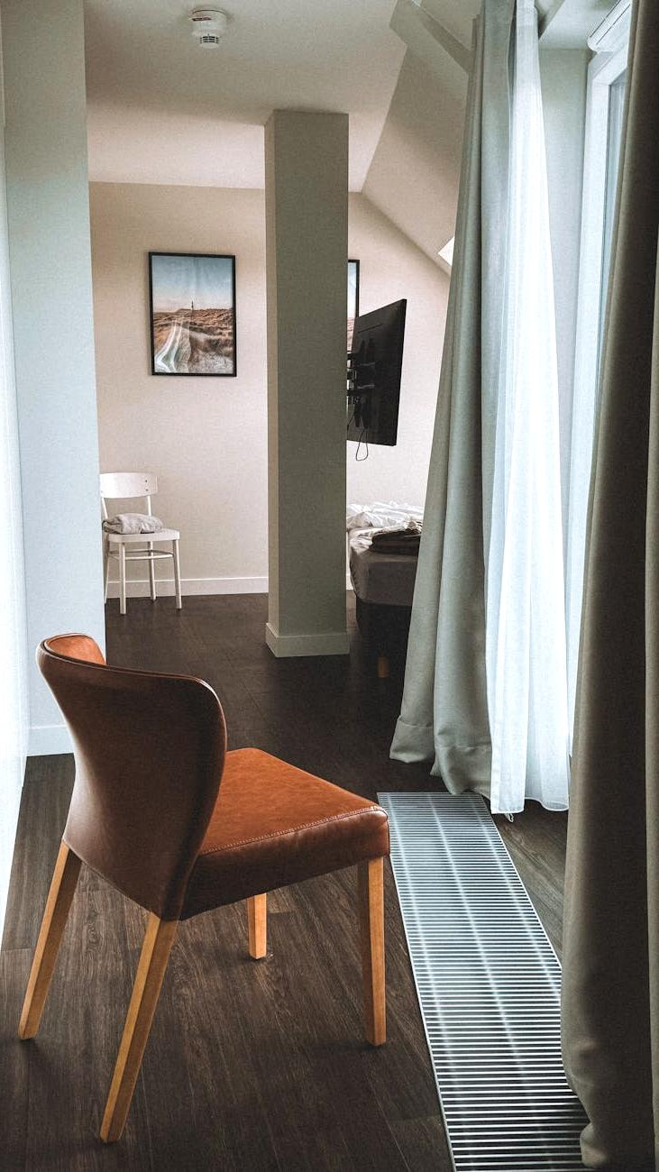 Founder and CEO Jane Doe smiling with modern office background